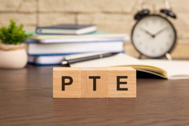 PTE - word concept from wooden blocks. wooden cubes with letters