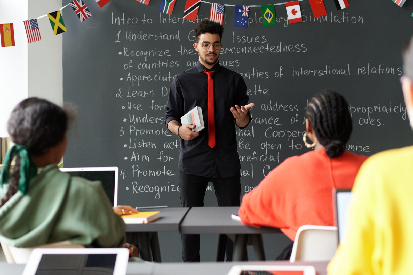 Teacher talking to students in the classroom